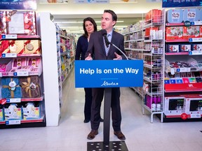 Premier Danielle Smith and Health Minister Jason Copping make an announcement about the availability of children's medication on Dec. 6, 2022 in Edmonton.
