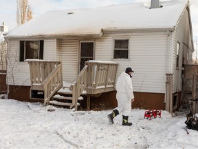 A fire investigator work at the scene of a fire at 10453 143 St. on Monday, Dec. 12, 2022, in Edmonton.