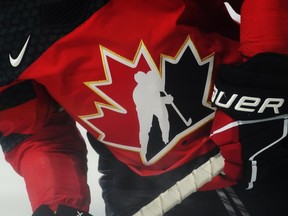 A Team Canada logo is shown on a player during the warm up prior to Rivalry Series hockey action against the United States in Kamloops, B.C., Thursday, Nov. 17, 2022. Some Nova Scotia hockey fans say their excitement for the world junior hockey championship is accompanied by tough conversations about Hockey Canada's conduct.