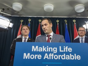 Affordability and Utilities Minister Matt Jones, along with Finance Minister Travis Toews and Seniors, Community and Social Services Minister Jeremy Nixon, share details on legislation aimed at supporting Albertans during the affordability crisis on Wednesday, Dec. 7, 2022 in Edmonton.