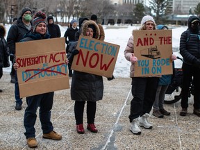 Protestors gather during an anti sovereignty act rally at the Legislature in Edmonton Alberta, December 4, 2022.