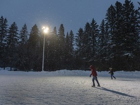 Edmonton Weather: A Very Foggy Friday Morning 3 Skaters work in the fallen snow on the Victoria Park Oval Tuesday, Dec. 27, 2022 in Edmonton.