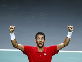 Canada's Felix Auger Aliassime celebrates after defeating Australia's Alex de Minaur during the final Davis Cup tennis match between Australia and Canada in Malaga, Spain, Sunday, Nov. 27, 2022. Auger-Aliassime is being rewarded for his breakthrough season by winning the Lionel Conacher Award as