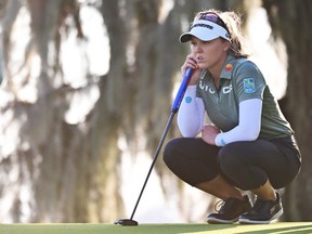 ORLANDO, FLORIDA - JANUARY 22: Brooke Henderson of Canada lines up a putt on the 18th green during the final round of the Hilton Grand Vacations Tournament of Champions at Lake Nona Golf & Country Club on January 22, 2023 in Orlando, Florida.
