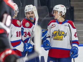 Edmonton Oil Kings Noah Boyko (34) celebrates his goal against the Moose Jaw Warriors with teammates Luca Hauf (18) and Ethan MacKenzie (47) in this file photo from Jan. 10, 2023 .