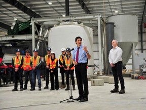 Canada's Prime Minister Justin Trudeau and Mayor Charlie Clark visit rare earths producer Vital Metals with Managing Director John Dorward in Saskatoon, Saskatchewan, Canada January 16, 2023.