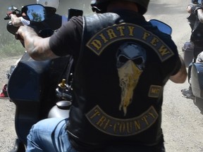 Four men believed to be associated with a known Hells Angels support club are facing charges related to intimidation and uttering threats. Two were observed wearing "full-patch" Tri-County Chapter Dirty Few Motorcycle Club leather vests.