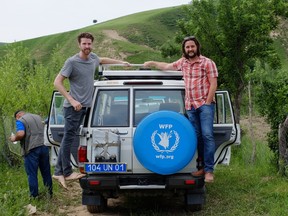 Earth Water founders Matt Moreau, left, and Kori Chilibeck pose during a trip to Tajikistan in 2017.