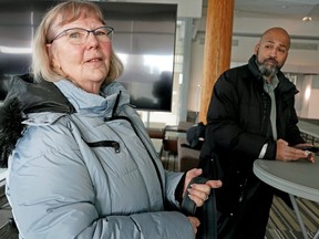 Kathy Ward, left, a senior who resides in Wetaskiwin, and Alberta NDP health critic David Shepherd answered questions at a news conference in Edmonton on Monday, Jan. 30, 2023. Ward cannot find a new family doctor after her family doctor announced that he is leaving Alberta.