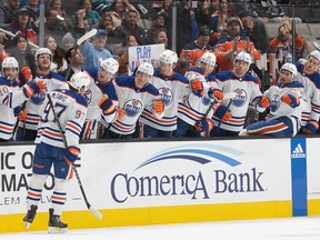 The Edmonton Oilers bench celebrates with centre Connor McDavid (97) during the first period against the San Jose Sharks at SAP Center at San Jose.