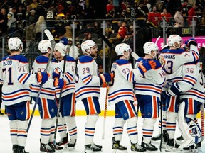 Jan 14, 2023; Las Vegas, Nevada, USA; The Edmonton Oilers celebrate after defeating the Vegas Golden Knights 4-3 at T-Mobile Arena. Mandatory Credit: Lucas Peltier-USA TODAY Sports