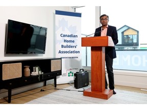 Rohit Group of Companies executive vice-president Adil Kodian speaks to the media from an Edmonton showhome, Wednesday, Jan. 11, 2023.