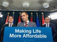Affordability and Utilities Minister Matt Jones, with Finance Minister Travis Toews and Seniors, Community and Social Services Minister Jeremy Nixon, share details on legislation aimed at supporting Albertans during the affordability crisis on Dec. 7, 2022.
