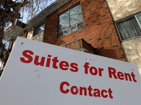 A suite for rent sign outside an apartment building in Edmonton on Jan. 30, 2023.