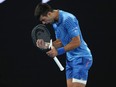 Tennis - Australian Open - Melbourne Park, Melbourne, Australia - January 21, 2023
Serbia's Novak Djokovic reacts during his third round match against Bulgaria's Grigor