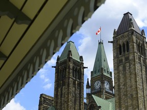 Parliament Hill is seen in Ottawa on Tuesday, July 21, 2020. The city of Ottawa is taking the federal government to court over a $21-million shortfall in what the city expected to collect on properties.THE CANADIAN PRESS/Sean Kilpatrick