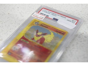 This 2003 Pokémon card from retails for $1,950. Several retailers of the trading card game have been hit with burglaries seeking cards. Photo by Shaughn Butts-Postmedia