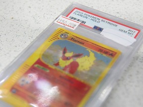 This Pokemon paper from 2002 retails for $1950, said Brian Tews of Taps Games connected Jan. 9, 2023. His store successful southbound Edmonton has been deed doubly by thieves targeting Pokemon cards. Shaughn Butts/Postmedia