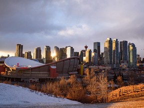 A view of Calgary's downtown skyline from Scotsman’s Hill was photographed at sunset on Monday, February 13, 2023.