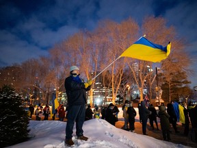 Local Ukrainians demonstrate their support for family and friends in Ukraine and here at home during the invasion of the European country by Russia during a rally at the Alberta legislature in Edmonton on Feb. 24, 2022. The Alberta council of the Ukrainian Canadian Congress is organizing a candlelight vigil at the Alberta legislature building on Friday to mark one year since the invasion.