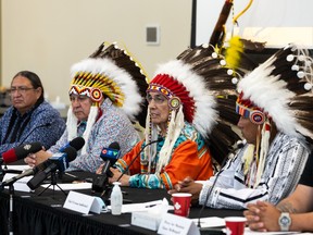 (Left to right) Chief Desmond Bull of Louis Bull Tribe, Chief Randy Ermineskin of Ermineskin Cree Nation, Chief Wilton Littlechild of Ermineskin Cree Nation, Chief Vernon Saddleback of Samson Cree Nation and Councillor Chase McDougall with Montana First Nation, spoke during a press conference in Maskwacis, south of Edmonton, on Monday, June 27, 2022.
