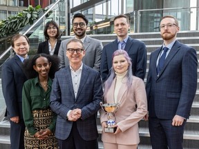 Bank of Canada governor Tiff Macklem (front row, centre) with the U of A?s 2023 Governor's Challenge winning team: (back row) Aishwarya Tyagi, Vivek Gala, Max Sties, James Davison; (front row) Malik Shukayev, Selam Abraham and Kayla Stephanson.