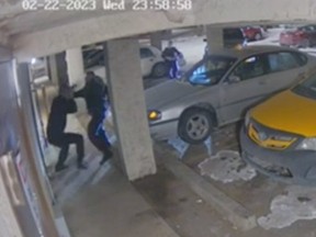 Security camera footage showing a Feb. 22, 2023, incident involving an Edmonton police officer and an 18-year-old driver. Video of the incident showing the officer repeatedly punching the driver emerged online several days later and is now subject to an investigation by the Alberta Serious Incident Response Team (ASIRT).