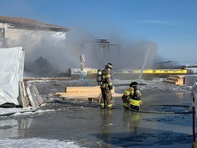 Edmonton Fire Rescue Services received a call about a fire at a home under construction near Glenridding Ravine Road SW and 15 Ave. SW on Friday, Feb. 24, 2023.