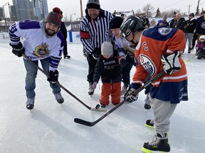 Members of the Downtown Division of the Edmonton Police service and kids from the McCauley community takepart in the 12th McCauley Cup on Saturday, February 25, 2023.