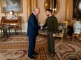 King Charles III meets Ukrainian President Volodymyr Zelenskyy during his first visit to the U.K since the Russian invasion of Ukraine at Buckingham Palace, London, Wednesday February 8, 2023. Aaron Chown/Pool via REUTERS