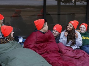 Members of 5 Days for the Homeless are seen at their camp site outside of the School of Business at the University of Alberta in Edmonton on March 8, 2015.