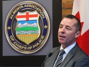 Alberta Association of Chiefs of Police president and Calgary police Chief Mark Neufeld speaks during a news conference in Calgary on Wednesday, Feb. 22, 2023. The news conference followed the association's release of results of a research paper on decriminalization.