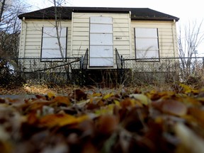 A boarded up home at 8807 116 Ave. in Edmonton, Friday Oct. 28, 2022.