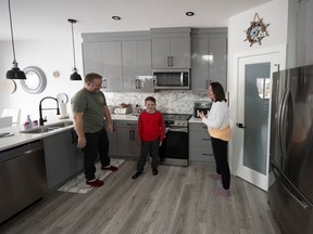 Danny and Holly Croke, with their son, Cooper, 9, love their new home by Sehjas Homes in Jesperdale, Spruce Grove.