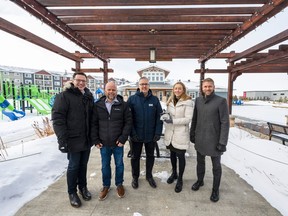 Nathan Peterson, Rich Westren, Peter Tsoukalas, Rene Fedor and Mike Kohl of Brookfield Residential celebrate Chappelle Gardens’ award of Best Growing Community.