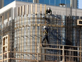 Construction crews work on the Winspear Project in downtown Edmonton, Thursday, Feb. 16, 2023.