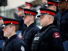 Edmonton Police Service officers seen during a graduation ceremony at city hall on Feb. 10, 2023. The Edmonton Police Commission confirmed this week the provincial appointment of two new police commission members, who have yet to be identified.
