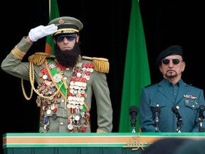 Image released by Paramount Pictures, Sacha Baron Cohen, left. portrays Admiral General Aladeen, left, and Ben Kingsley portrays Tamir in a scene from 'The Dictator.'
