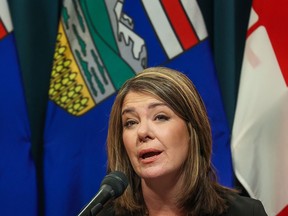 Premier Danielle Smith speaks about surgery wait times at a press conference in Calgary on Monday.