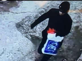 The suspect is described as male, 6'0", 20's, with a slim build. He was last seen wearing a red paper mask with flames on it, a black sweater, and black pants. Toronto Police Services