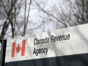 The Canada Revenue Agency sign outside the National Headquarters at the Connaught Building in Ottawa is seen on Monday, March 1, 2021.