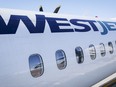 WestJet customers say they were rebooked on a seven-and-a-half-hour bus trip from Calgary to Regina after their flight was cancelled Sunday.
