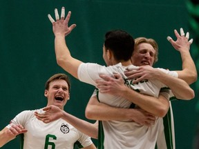 University of Saskatchewan Huskies celebrate their win against the University of Calgary Dinos in men's volleyball. The Huskies defeated the Dinos 3-0. Photo taken in Saskatoon on Saturday, Feb. 11, 2023.