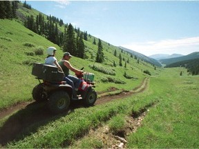 An all-terrain vehicle travels a well-worn trail in the Bighorn Wildland Recreation Area. Postmedia File Photo