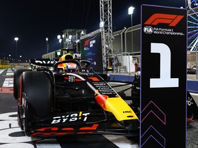 BAHRAIN, BAHRAIN - MARCH 04: Pole position qualifier Max Verstappen of the Netherlands driving the (1) Oracle Red Bull Racing RB19 stops in parc ferme during qualifying ahead of the F1 Grand Prix of Bahrain at Bahrain International Circuit on March 04, 2023 in Bahrain, Bahrain.