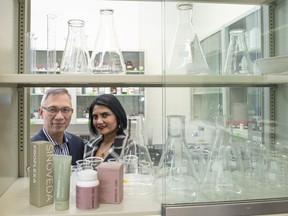 Pharmaceutical scientists and spouses Yun Tam, left, and Nuzhat Tam-Zaman in the lab in their south Edmonton offices. The pair co-founded Sinoveda, a health-science company behind Effecti-cal, a calcium supplement, and Proflexa, a topical pain relief cream — both due to appear in Hollywood nominee gift bags.