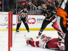 Nick Bjugstad scores against Red Wings goaltender Magnus Hellberg in the shootout during an Arizona Coyotes’ win in January. Bjugstad, who has developed into an all-around player, has 13 goals this season.