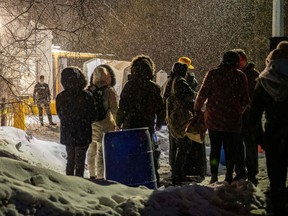 Migrants from Venezuela, Nigeria, Haïti and other countries arrive at Roxham Road to cross the border into Canada in early March 2023.