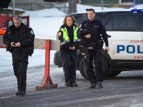 Edmonton Police respond to incident at Baywood Apartments at 114 Avenue and 132 Street. Officers confirm they are mourning the loss of two patrol officers.