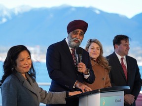 Harjit Sajjan, second left, minister of international development and minister responsible for the Pacific Economic Development Agency of Canada, speaks as International Trade, Export Promotion, Small Business and Economic Development Minister Mary Ng, from left to right, Foreign Affairs Minister Melanie Joly and Public Safety Minister Marco Mendocino listen during a news conference to announce Canada's Indo-Pacific strategy, in Vancouver on Nov. 27, 2022.